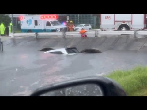 Car in canal at West Esplanade and Oaklawn in Metairie