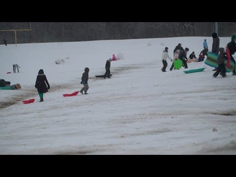 A tale of two cities: Plano kids relish the snow, Dallas kids wish there was more