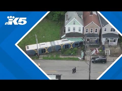 Bus barrels into front of Pittsburgh home