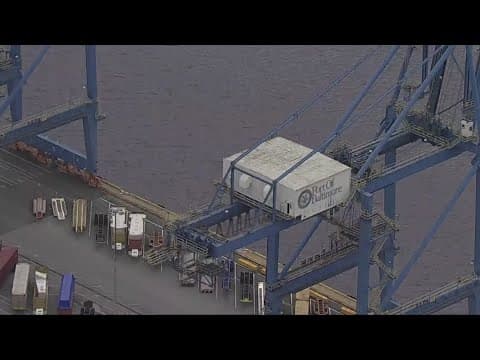 Ports reopen on East Coast after strike ends