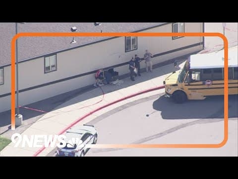 No one injured when bus rolls into mobile unit at Aurora elementary school