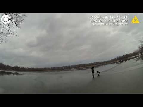 Police officer rescues dog who fell through ice on lake