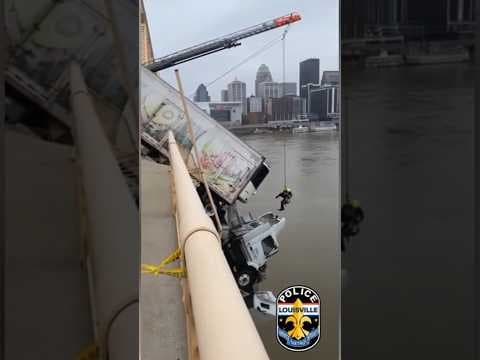 See the harrowing rescue of driver from truck dangling off bridge