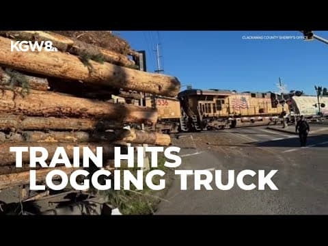 Train hits logging truck near Canby