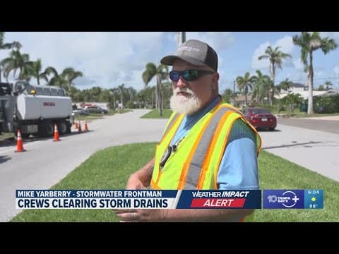 Crews in Treasure Island work to clear storm drains to prevent flooding