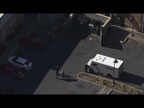 Armored truck driver shoots at armed suspects during robbery attempt