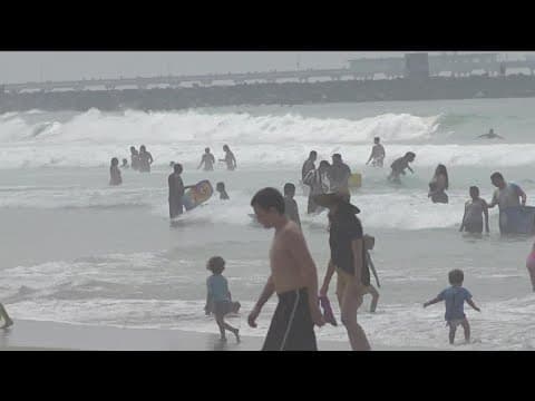 Massive crowds flock to San Diego beaches amid record breaking heat