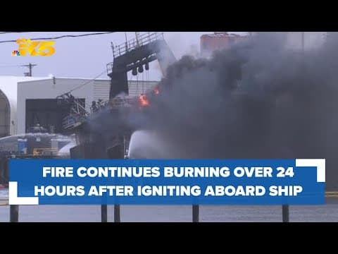 Fire continues burning aboard ship moored in Tacoma a full day after it ignited