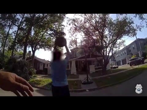 Tampa Police officer plays pickup basketball with kid he sees on duty