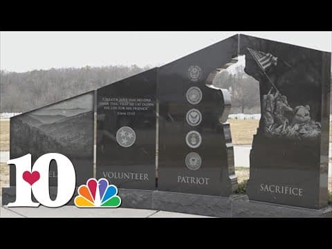 Volunteers pick up wreaths at veteran graves