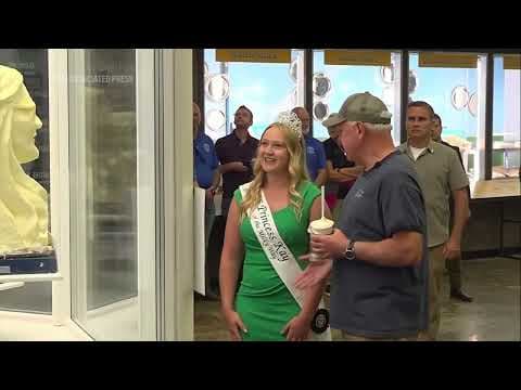 It's a pork chop on a stick and a vanilla shake for Tim Walz at the Minnesota State Fair