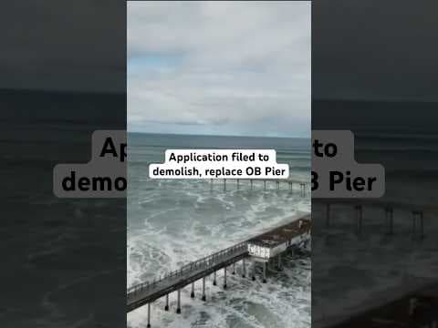 A sign at the OB Pier says an application was filed with the City of San Diego for its demolition.