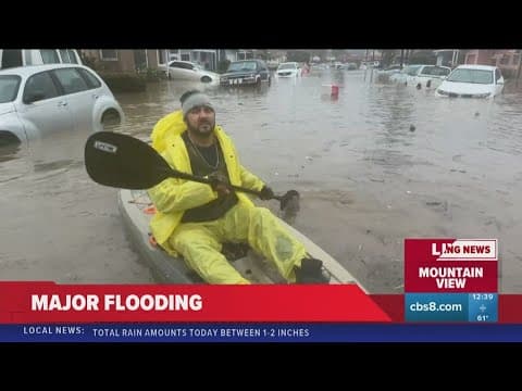 42nd Street in Mountain View underwater as residents try to find those in need of help