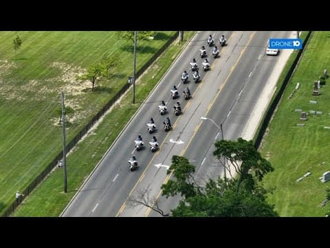 Drone video shows procession for Deputy Daniel Sherrer