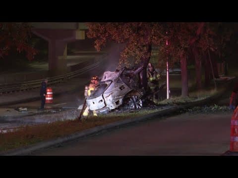 Raw video: Woman dies after BMW split in half, burst into flames in crash on Memorial Drive, Houston