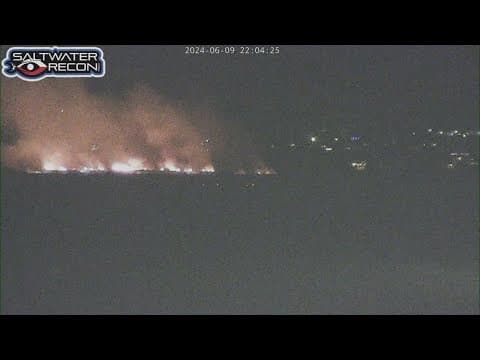 Grass fire burning on Bolivar Peninsula