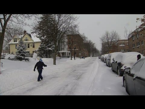 Twin Cities residents work to dig out sidewalks and side streets