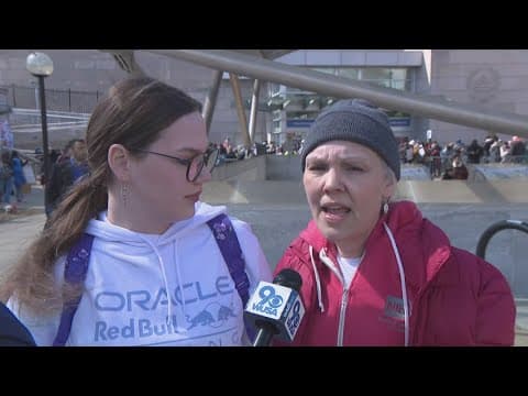 Rally outside NIH headquarters opposes possible cuts to healthcare research