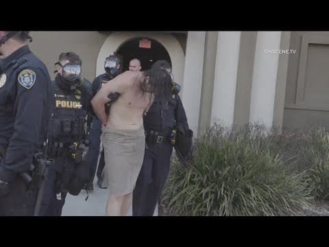 Man detained after vandalism spree, apartment standoff