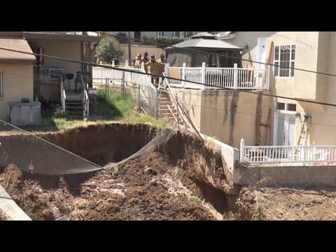 Backyard sinkhole forces neighbors in Valencia Park to evacuate their homes
