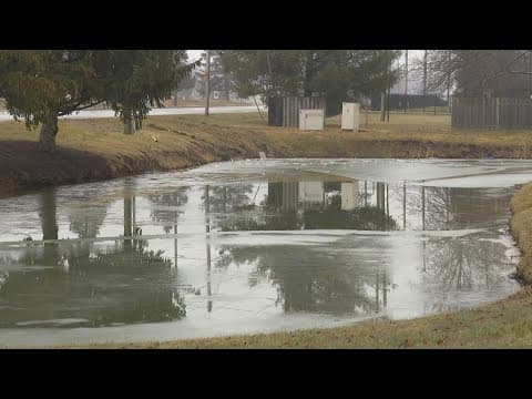 2 people left with minor injuries after vehicles crash into Indianapolis pond