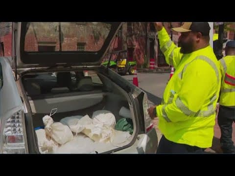 Sand bags being handed out in Alexandria, Virginia for Tropical Storm Debby