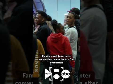 Hours after evacuating, families waiting to re-enter the Dallas convention center for NCA contest