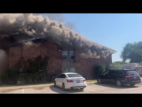 Crews battle fire as heavy smoke billows from a North Texas apartment complex