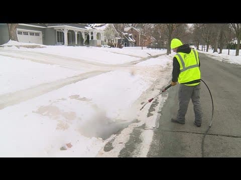 Storm drain cleaning ahead of Tuesday's rain/snow