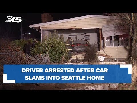 BREAKING: Driver arrested after car slams into Seattle home