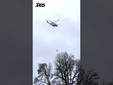 Coast Guard helicopter team rescues people from flood waters in Washington