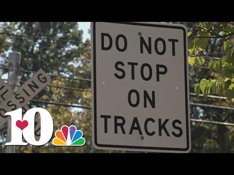 City installs warning signs, street markings at rail crossing where 3 UT coaches died