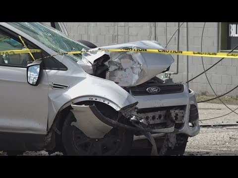 Car crashes into powerlines on Indy's near northwest side