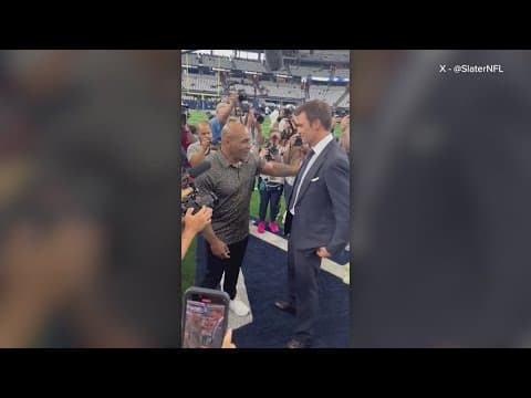 Mike Tyson chats with Tom Brady before Sunday's Cowboys game