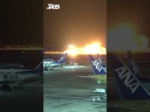 Tokyo flight bursts into flames after collision on runway