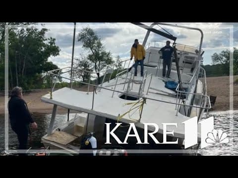 Boat removed from island in St. Croix River after being left stranded for months