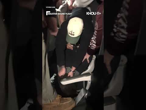 Passenger restrained after cracking window during mid-flight chaos on Houston-bound flight