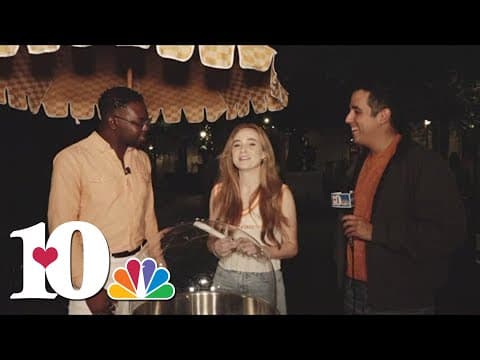 Flossy Cotton Candy Knoxville serving up an orange, sweet treat