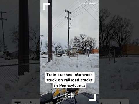 Train crashes into truck stuck on railroad tracks in Pennsylvania