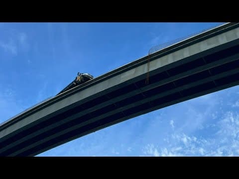 Raw video: Truck hangs off flyover connecting Westpark Tollway to Grand Parkway