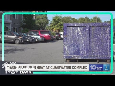 Exposed trash bakes in sun at Clearwater apartment complex