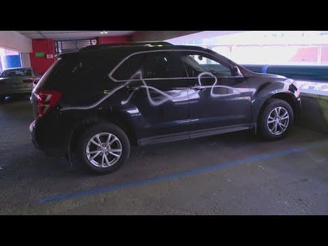 Vandal arrested for spray painting 50+ cars in downtown Indianapolis garage