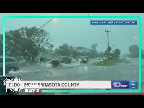 Flash flooding swamps Sarasota, subermging roads and cars