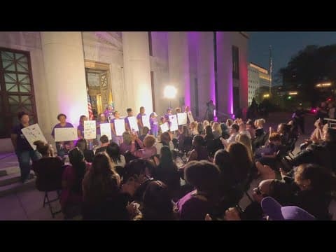 Columbus City Hall glows purple to honor domestic violence survivors