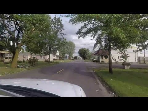 Neighbors react after severe weather damage in Kenton