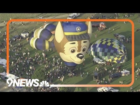 Hot air balloons fill the sky above Frederick
