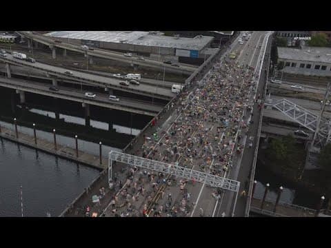 Naked bike riders demonstrate against federal troops in 'quintessentially Portland' protest