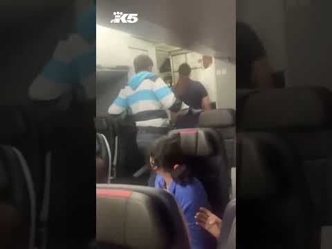 New video shows unruly passenger removed from Seattle-bound flight