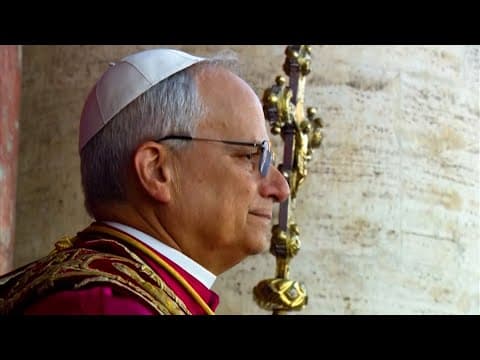 Cardinal Robert Prevost steps onto balcony at St. Peter's Basilica as the new pope