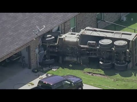 Dump truck driver was injured after crashing into a house in North Texas